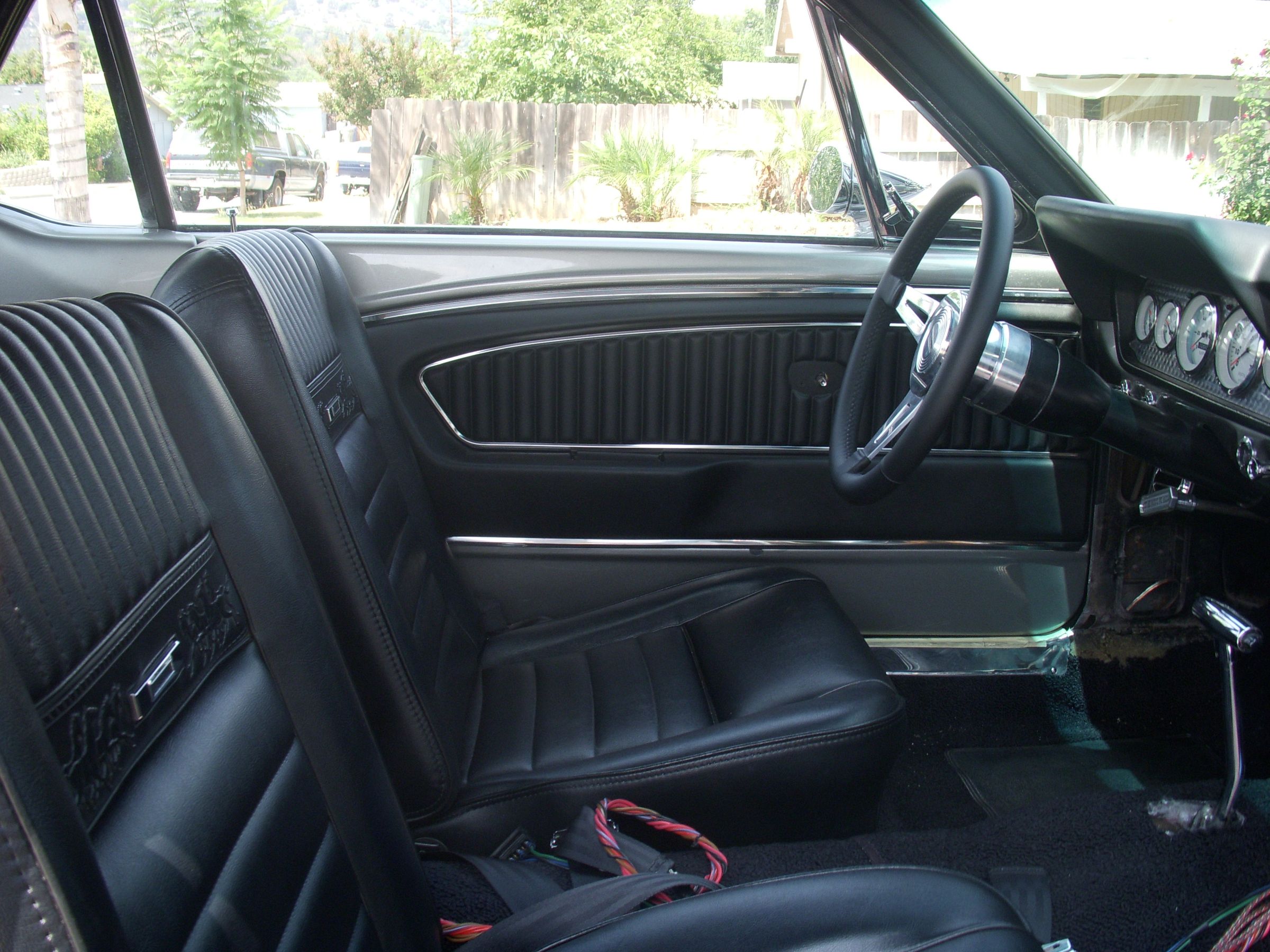 1966 Mustang black interior, driver side